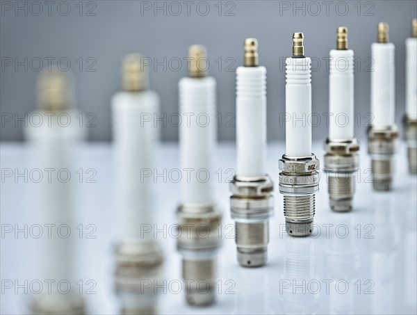 Spark plugs standing in a row