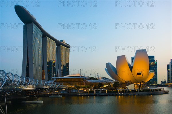 Marina Bay Sands hotel and ArtScience Museum at dusk