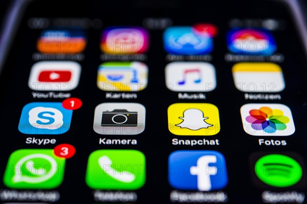 IPhone screen displaying multiple app icons