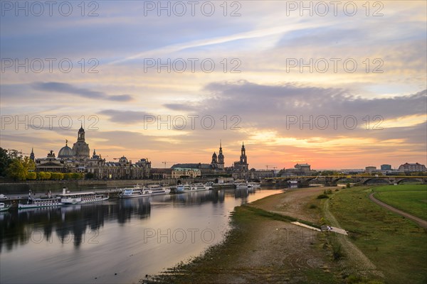 Sunset from the Carolabrucke with view of the Elbe meadows Konigsufer