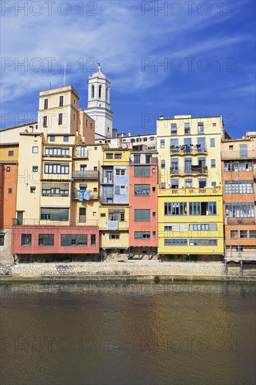 Colorful houses and Cathedral on the Onyar River