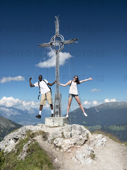 Couple at the summit cross