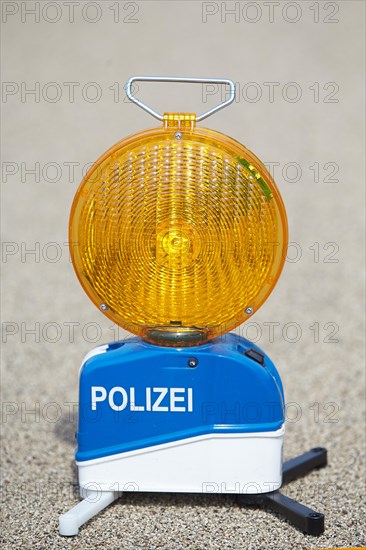 Warning lamp of the motorway police on the highway