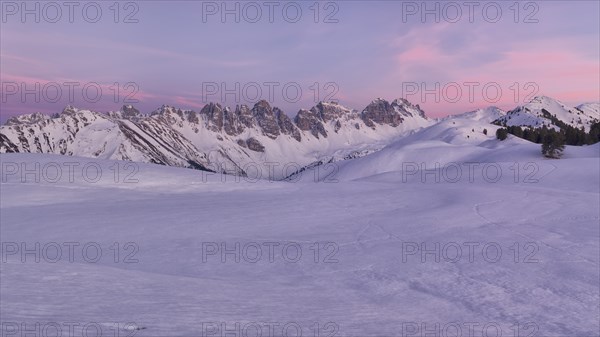 Snow-covered lake Salfeinssee on a winter evening