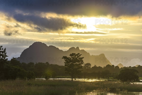 Sunset above tower karst mountains