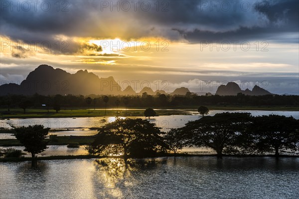 Sunset above tower karst mountains