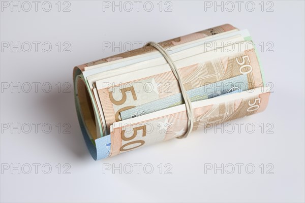 Roll of money with rubber band