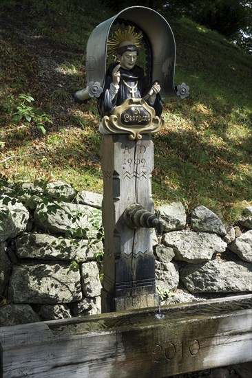 Wood sculpture of holy St. Leonhard