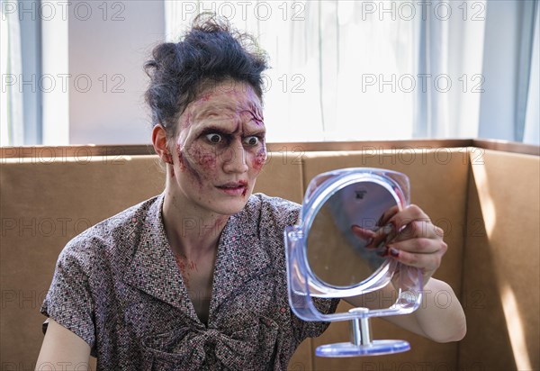 Zombie looks in the mirror