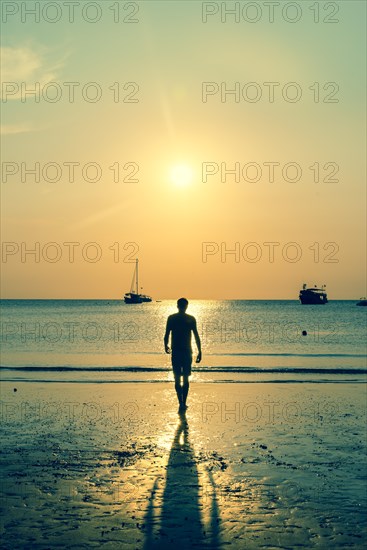 Young man on beach