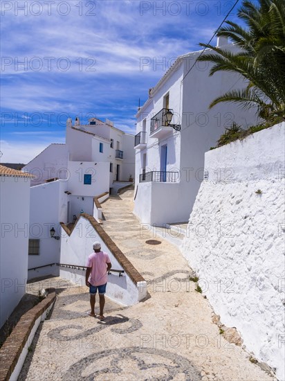 White houses in narrow alleyway