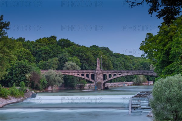 Maximiliansbrucke bridge over the Isar at dusk
