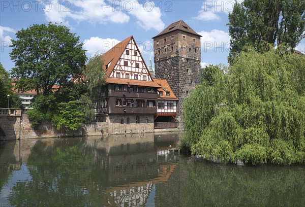 Old timbered houses and hanging tower