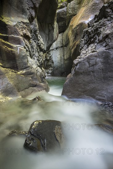 Tauglbach river flows through the Taugler Strubklamm