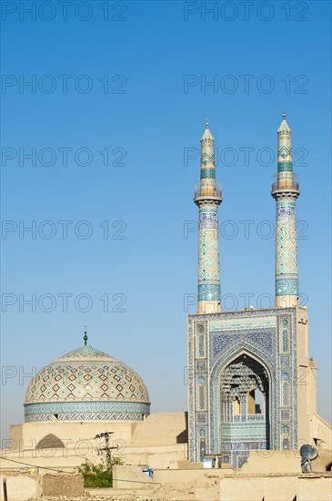 Dome and entrance porch with double minaret