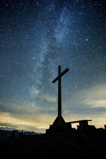 Summit cross at night on the Diedamskopf