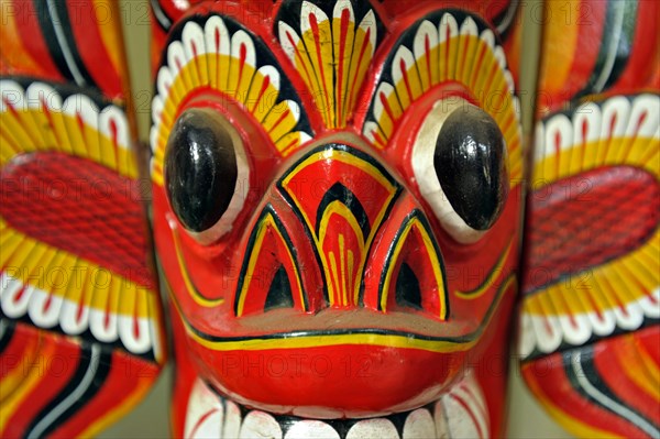 Red wooden mask