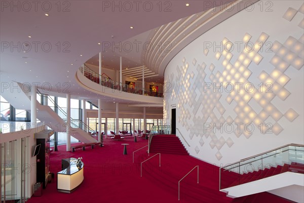 Spacious foyer with decorative light installation