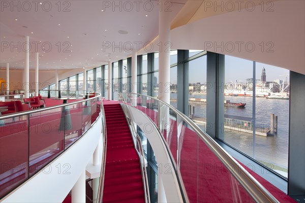 Stairs to the rank foyer with views of the city