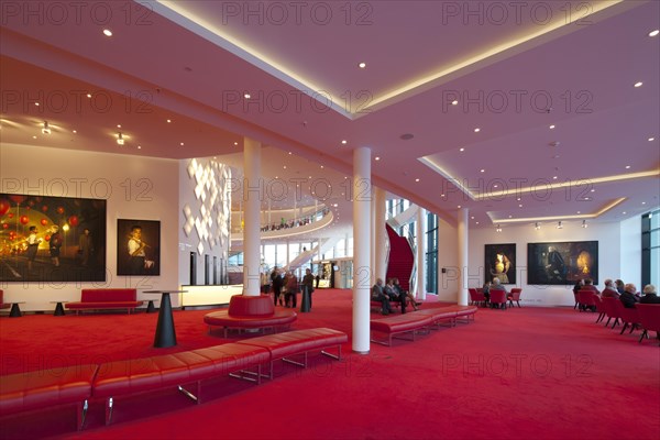 Spacious foyer decorated with modern art