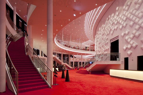 Large foyer on two floors with decorative light installation