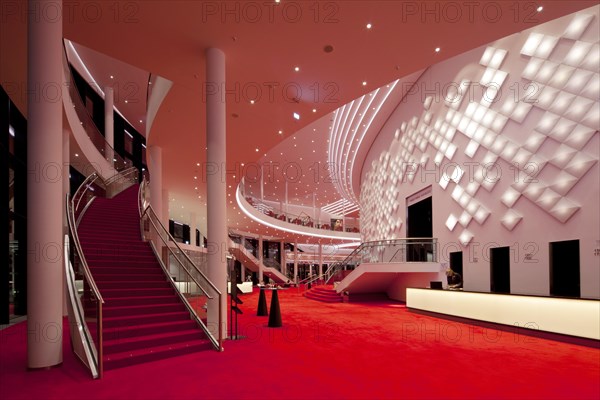 Large foyer on two floors with decorative light installation