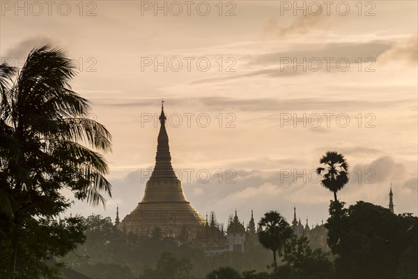 Golden stupa at sunset