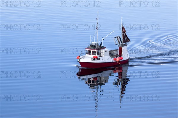 Fishing boat with reflection on Sildpollen