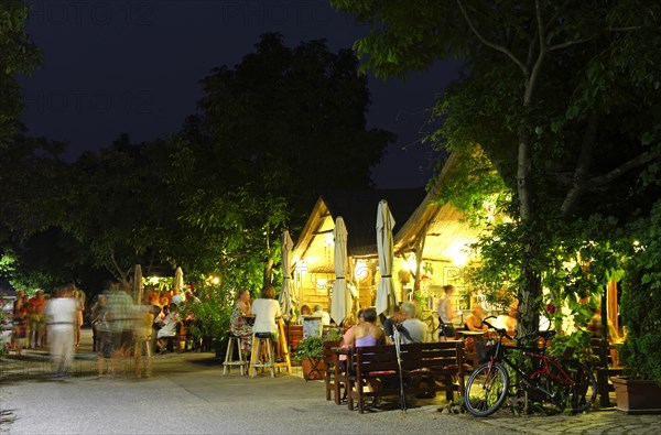 Buschenschanke or wine taverns on Kellergasse at dusk