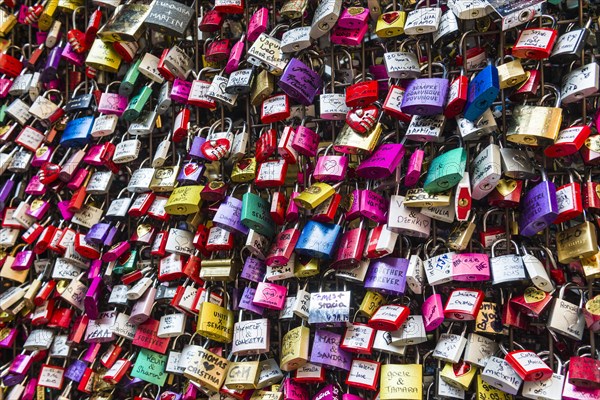 Many colourful love padlocks at the wall of Juliet's house