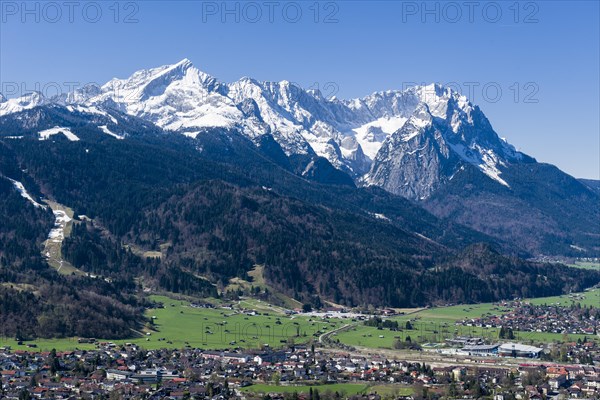 Townscape with the mountains Zugspitze and Alpspitze mountains