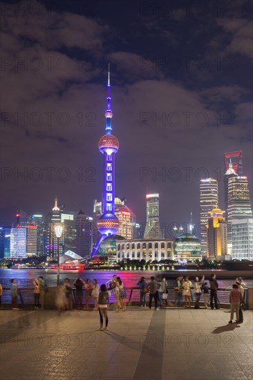 Pudong financial district with Oriental Pearl Tower at night