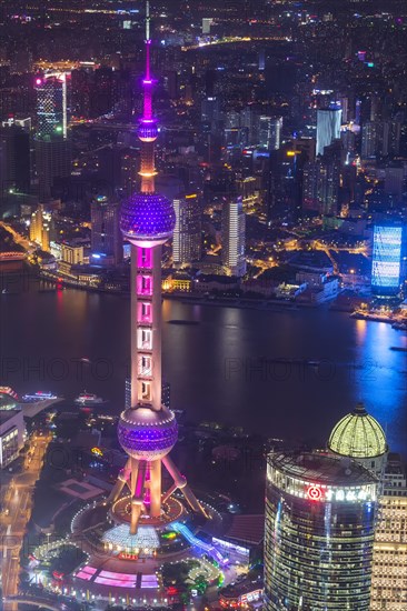 View over Pudong with Oriental Pearl Tower at night