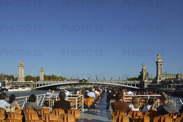 Excursion boat on the river Seine in front of Pont Alexandre III