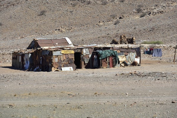 Corrugated iron hut on roadside