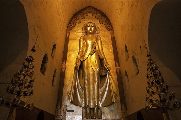 Standing gilded Buddha