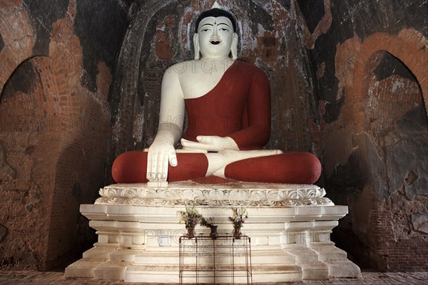 Seated Buddha with red robe