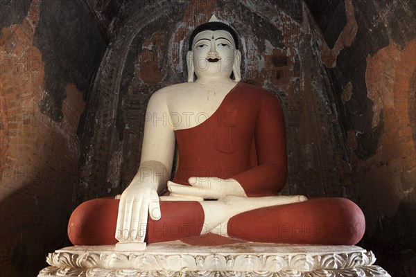 Seated Buddha with red robe