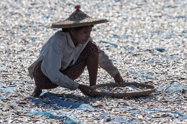 Local woman wearing straw hat