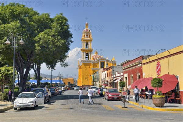 Road at Zocalo with the church of San Pedro Apostolo