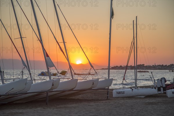 Sailboats at sunset