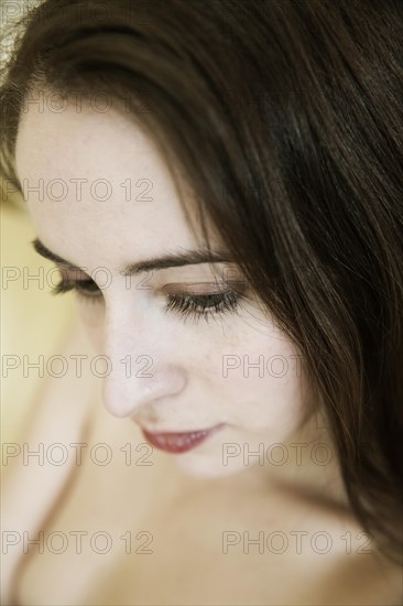 Young woman with dark brown hair