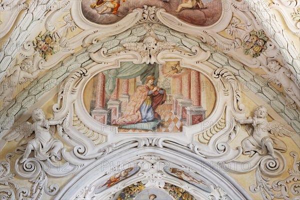 Stucco and frescoes on the ceiling