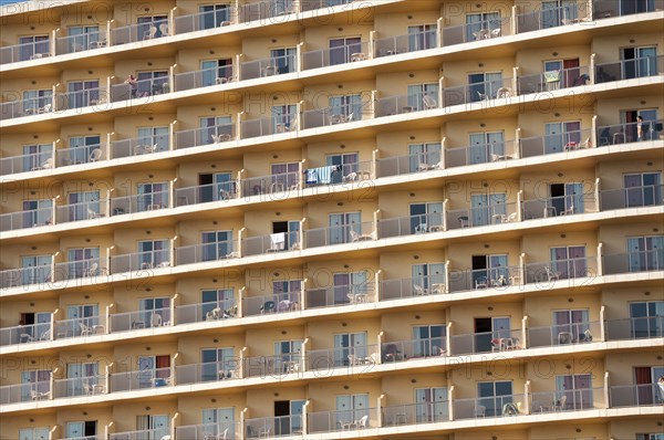 Rows of balconies on the facade of a large hotel complex in Torremolinos