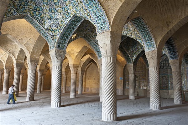 Decorated pillars in the prayer hall of the mosque Wakil also Vakil Mosque or Masjid-e Vakil