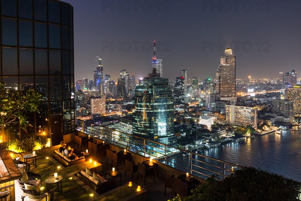 Skyline with CAT Telecom Tower and Lebua State Tower at night