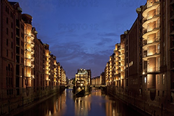 Speicherstadt with Wasserschlosschen little water castle in the late evening