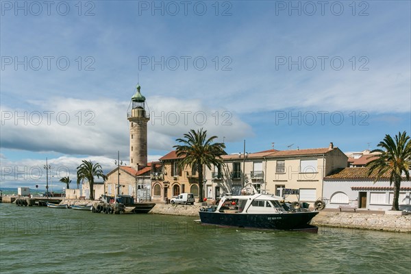 Lighthouse on the banks of a canal