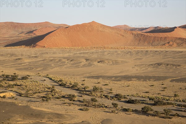 Arid plains and dry riverbed of the Tsauchab river at the edge of the Namib Desert
