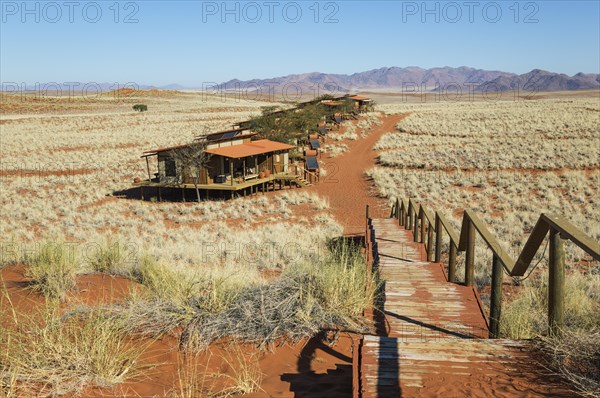 The chalets of the exclusive Wolwedans dunes lodge in a beautiful desert setting at the edge of the Namib Desert